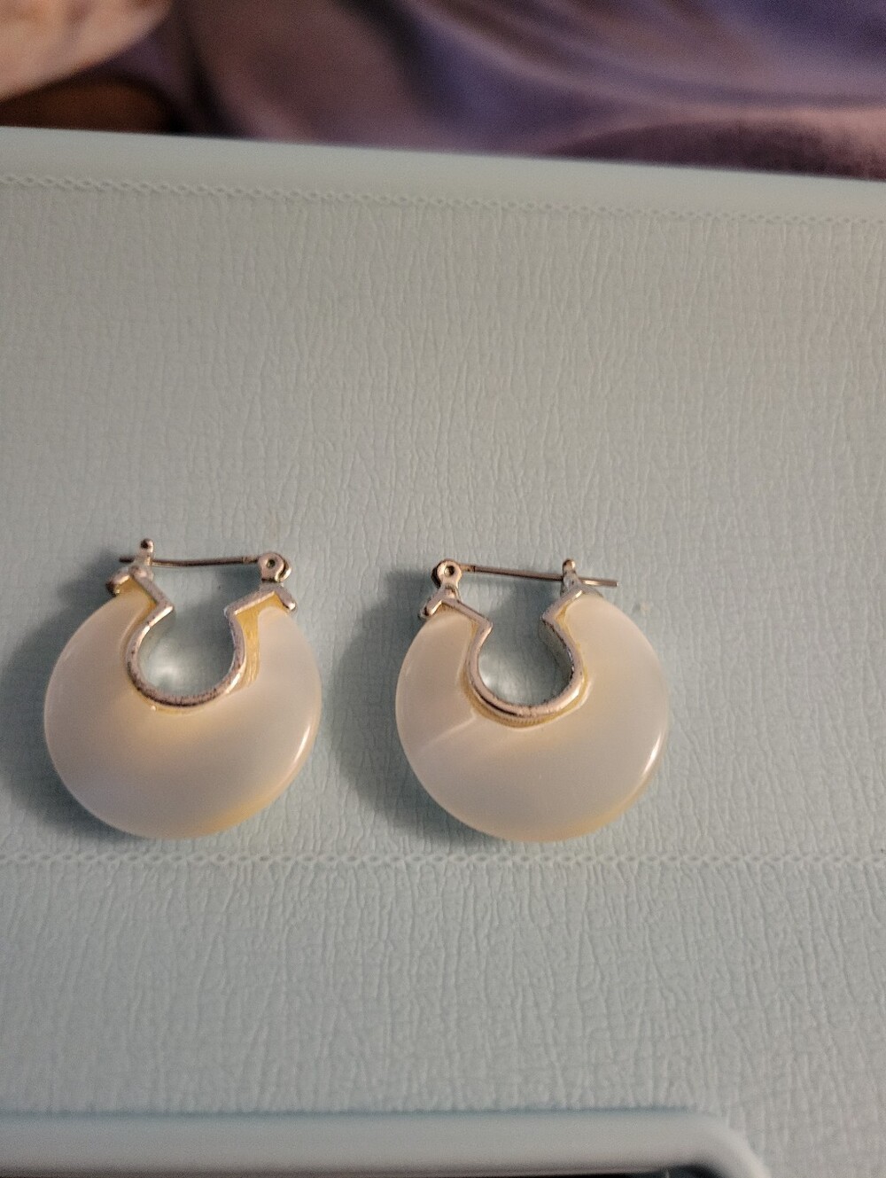 Elegant Cream Hoop Earrings with Silver Accents